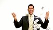 Businessman joyfully throwing his money