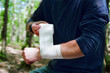 Applying an arm medical bandage