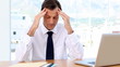 Businessman having a headache