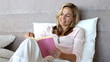 Video: Blonde woman enjoying a book Blonde woman enjoying a book