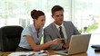 Business people working on laptop
