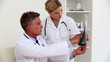Video: Doctors examining x-ray Doctors examining x-ray