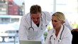 Team of doctors working on a computer