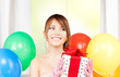 party girl with balloons and gift box