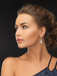 woman with diamond earrings