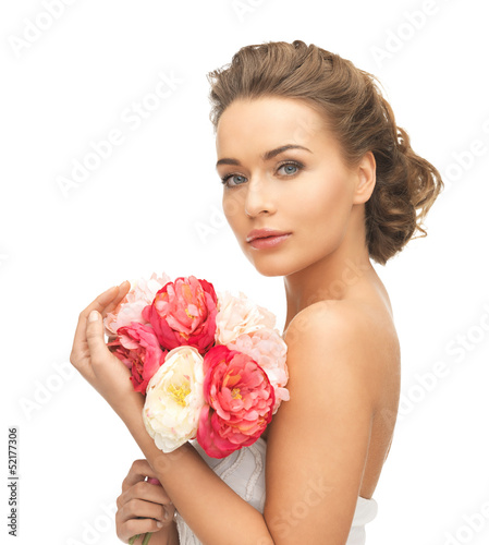 Photo: woman with bouquet of flowers woman with bouquet of flowers