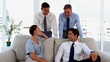 Business people waiting in a bright room