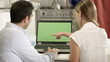 Man and woman with laptop computer for email and internet