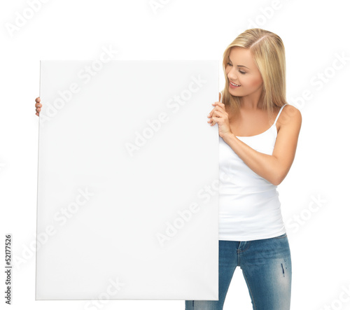 Photo: woman with white blank board woman with white blank board