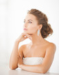woman wearing shiny diamond earrings