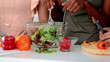 Video: Women preparing food together while cutting vegetables Women preparing food together while cutting vegetables