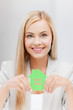 woman with illustration of eco house