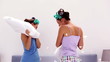 Video: Friends in hair rollers having pillow fight Friends in hair rollers having pillow fight