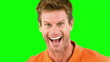 Man being surprised on green screen