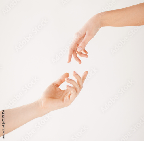 Photo: woman and man hands woman and man hands