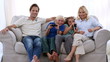 Video: Happy family playing video games at home Happy family playing video games at home