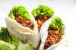 Photo: pita bread filled with Mexican mixture pita bread filled with Mexican mixture