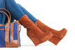 detail of sitting woman wearing fashionable platform brown shoes