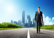 Photo: business man walking on the road business man walking on the road