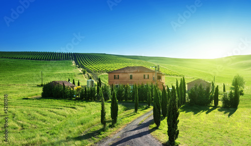 Photo: Tuscany landscape with typical farm house, Italty Tuscany landscape with typical farm house, Italty