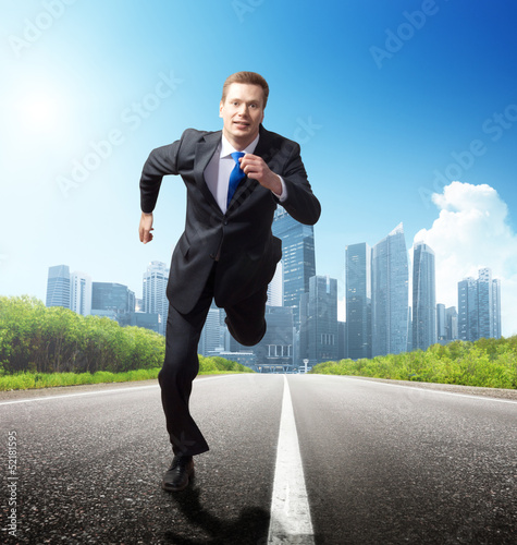 Photo: business man run on the road business man run on the road