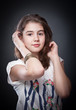 Beautiful europeean teen girl with long straight hair, posing