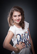 Beautiful europeean teen girl with long straight hair, posing