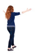 back view of walking  woman.