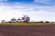Big Industrial Farm With Cloudy Sky