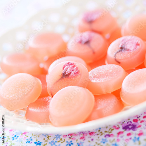 Photo: Homemade sweets with cherry blossom (Sakura), selective focus Homemade sweets with cherry blossom (Sakura), selective focus