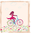 Silhouette of girl on bike