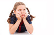 Angry little young girl child, isolated on white background