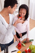 Couple Chopping Vegetables
