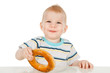 Photo: Little boy with bagel Little boy with bagel