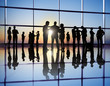 People working in a busy building office