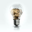 Foto: A light bulb with a Dollar coins inside A light bulb with a Dollar coins inside