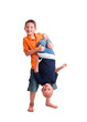 Photo: Two young brothers playing rough with each other. Two young brothers playing rough with each other.
