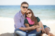 Portrait of young man and woman on a beach