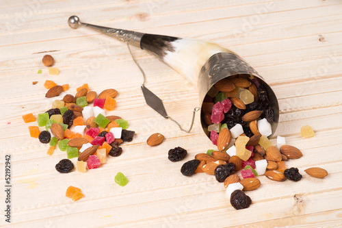 Photo: Dried fruits on a wooden surface Dried fruits on a wooden surface