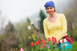 Photo: Gardening - mature woman working in the garden Gardening - mature woman working in the garden
