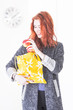 Happy woman put fruit in eco friendly cloth bag