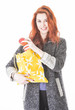 Happy woman put fruit in eco friendly cloth bag