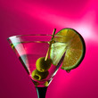 martini with lime and green olives