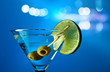 martini with lime and green olives