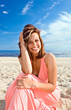 girl in pink dress on seacoast
