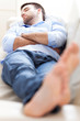 Photo: Man sleeping on sofa Man sleeping on sofa