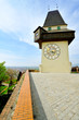 Old clock tower in the city of Graz, Austria