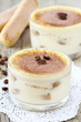 Delicious Italian dessert Tiramisu in a glass bowl