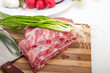 Foto: chopping fresh pork ribs and vegetables chopping fresh pork ribs and vegetables