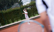 Male serving at tennis
